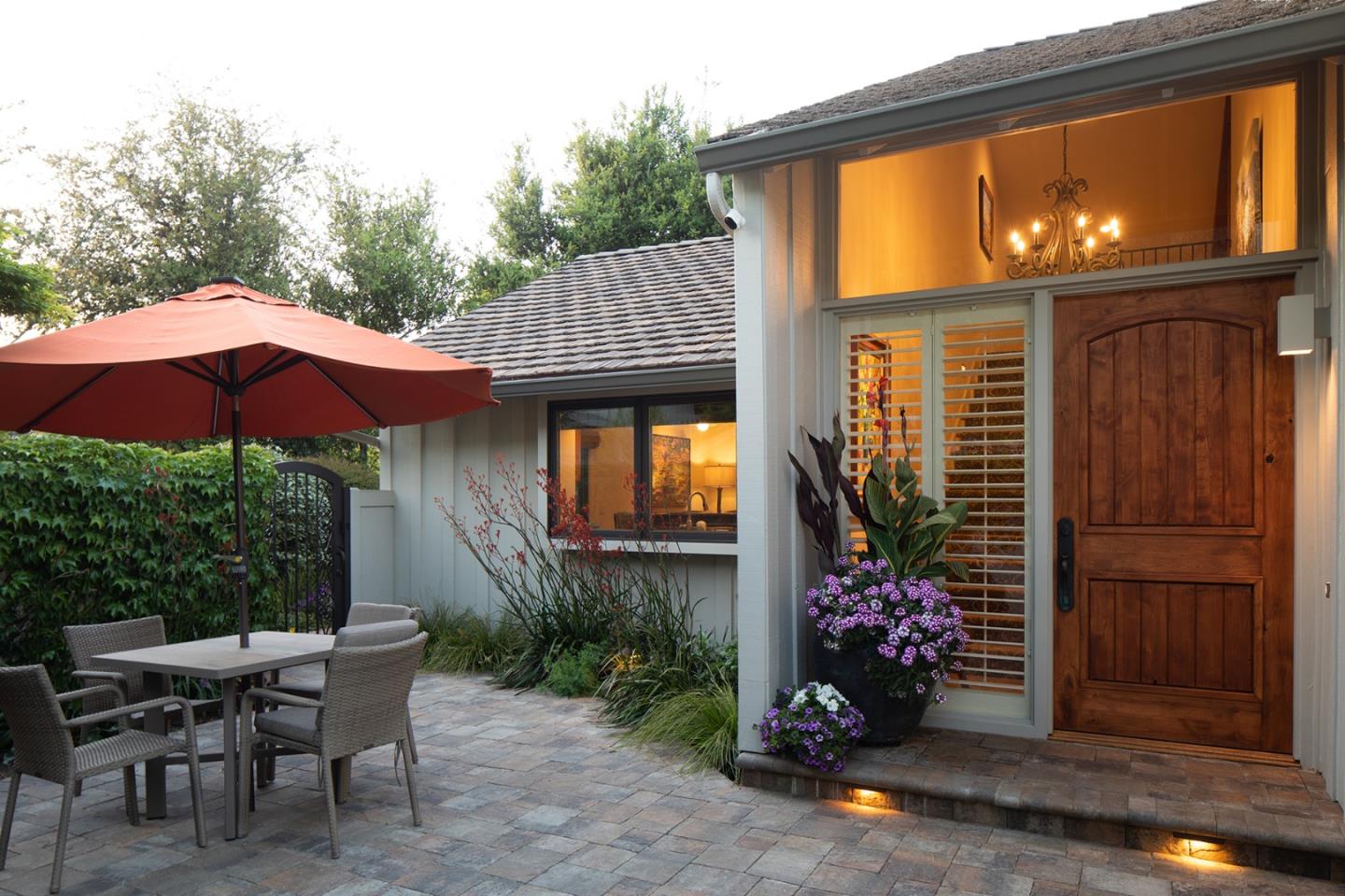 9546 Maple Court Carmel, CA 93923 - Photo 24 of 27 a view of a house with backyard sitting area and garden