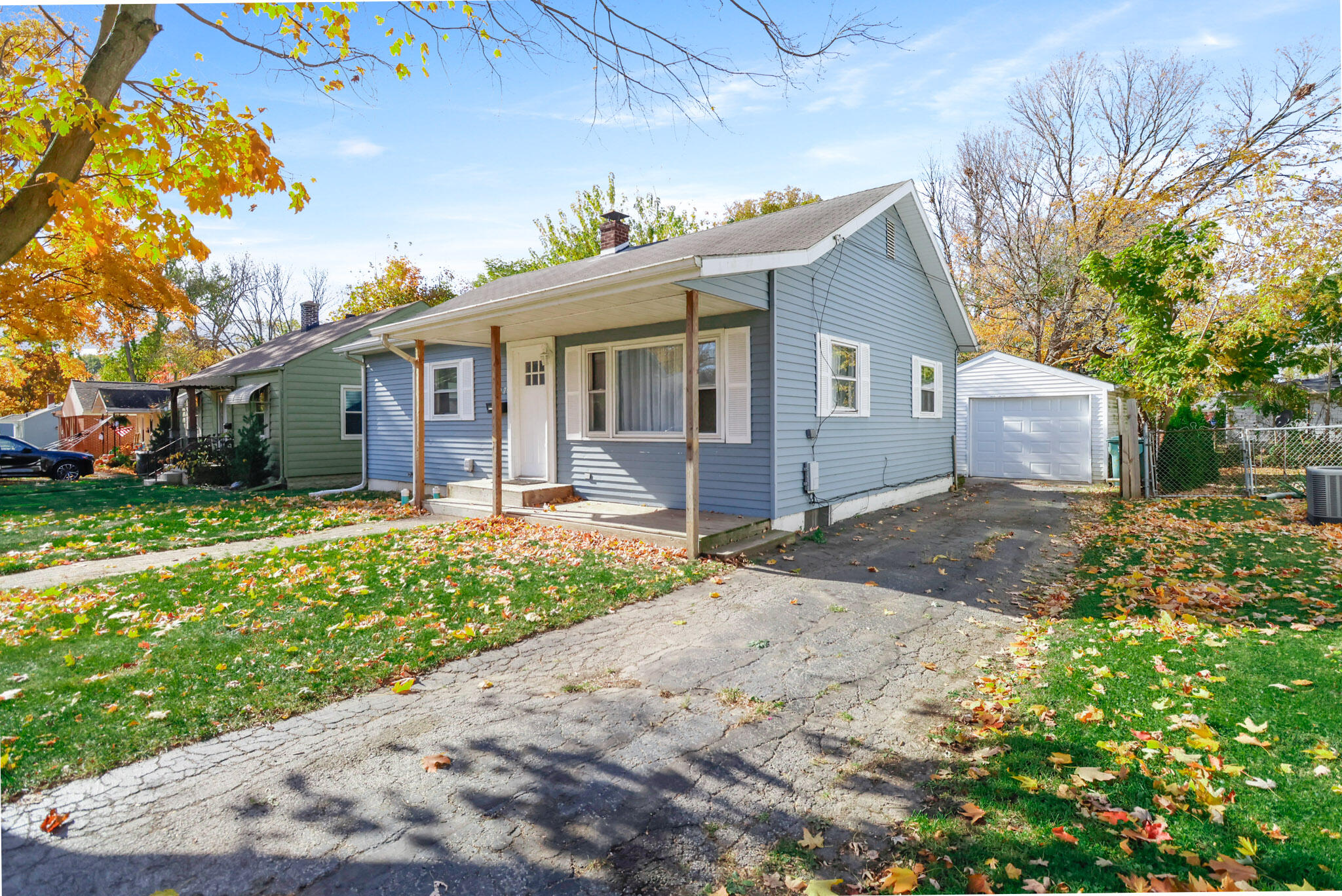 607 Madison Street Valparaiso, IN 46385 - Photo 2 of 15 a front view of house with yard and trees around