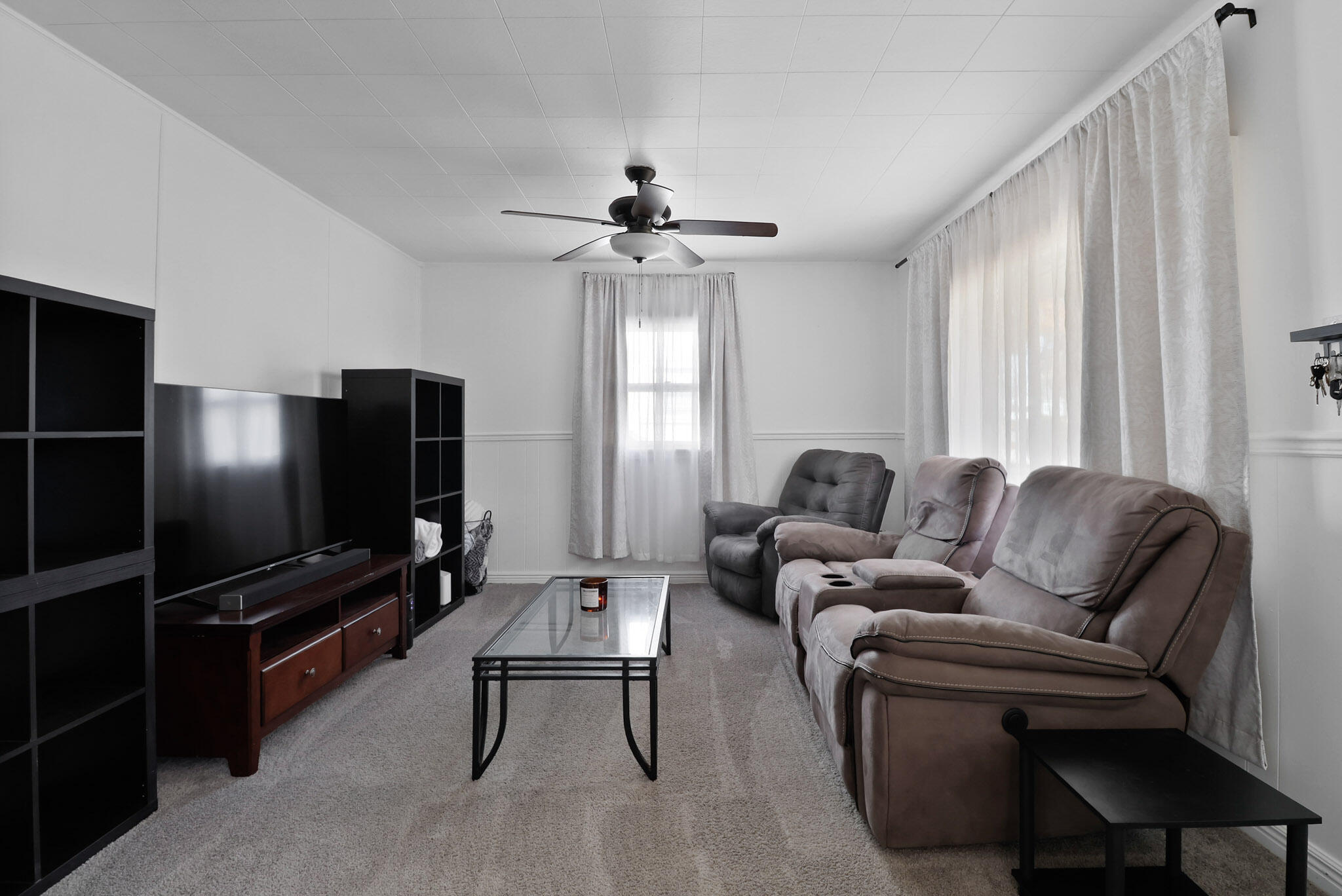 607 Madison Street Valparaiso, IN 46385 - Photo 5 of 15 a living room with furniture and a flat screen tv