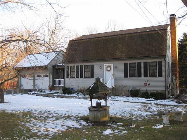 8 Woolam Road East Windsor, CT 06088 - Photo 1 of 1 a front view of a house with a yard