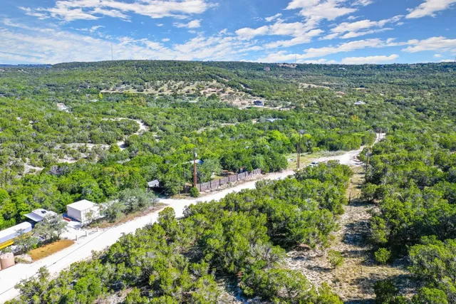 a view of a lake with a city
