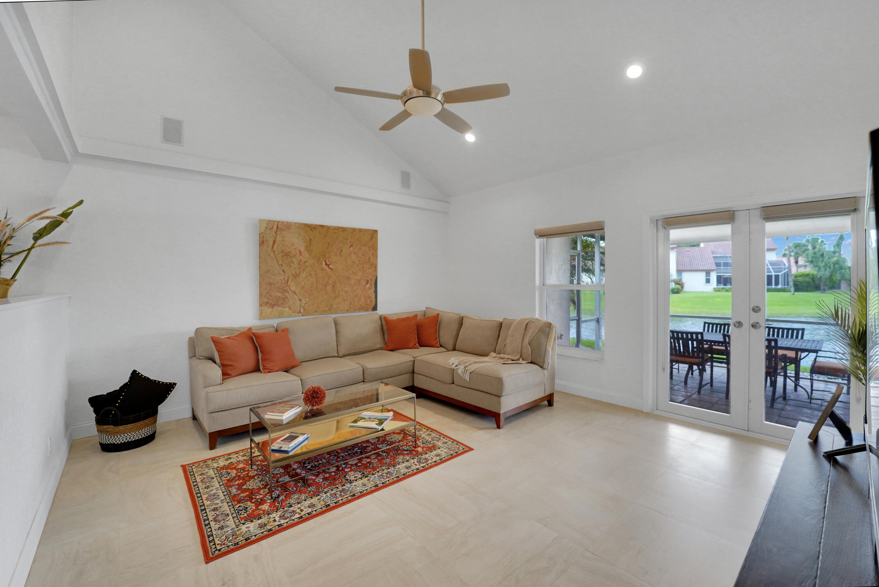 23351 Water Circle Boca Raton, FL 33486 - Photo 20 of 59 a living room with furniture and a large window