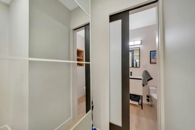 a bed room with furniture and a window