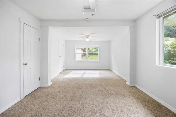 an empty room with windows