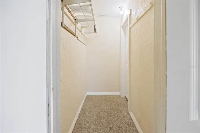 a view of hallway with stairs