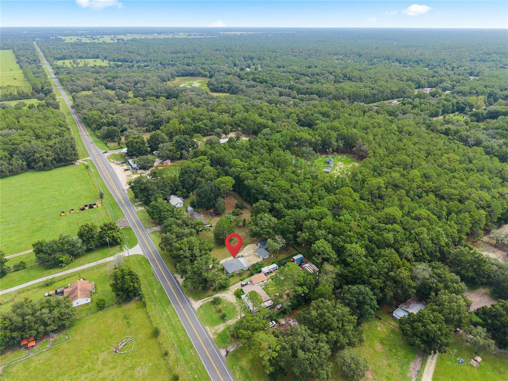 3157 Highway 41 Dunnellon, FL 34432 - Photo 31 of 38 a view of a garden with an outdoor seating