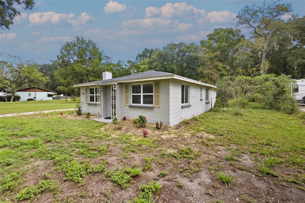3157 Highway 41 Dunnellon, FL 34432 - Photo 38 of 38 a view of a house with a yard