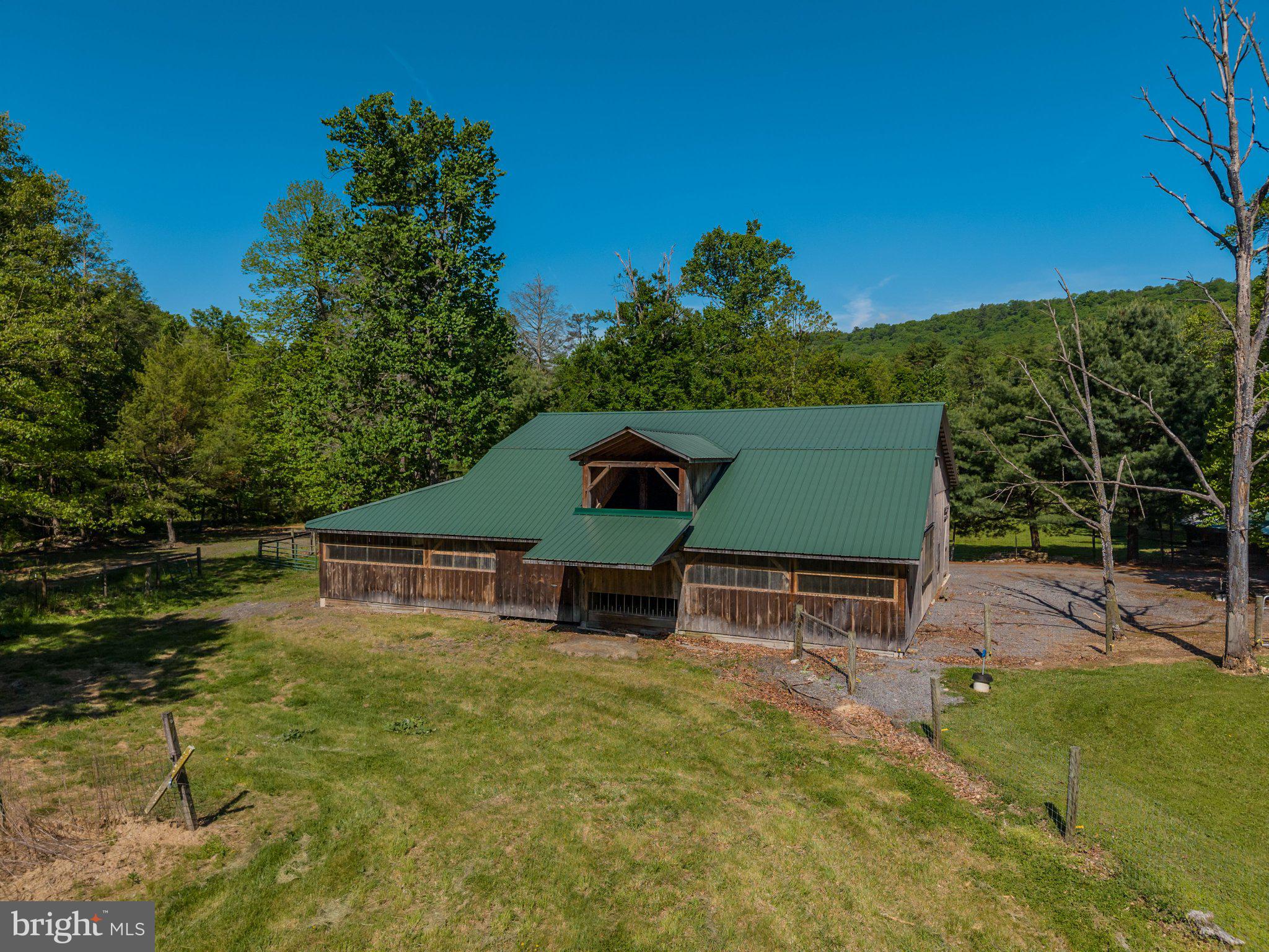 1520 Lingle Valley Road Milroy, PA 17063 - Photo 41 of 144 Charming barn nestled in lush greenery.