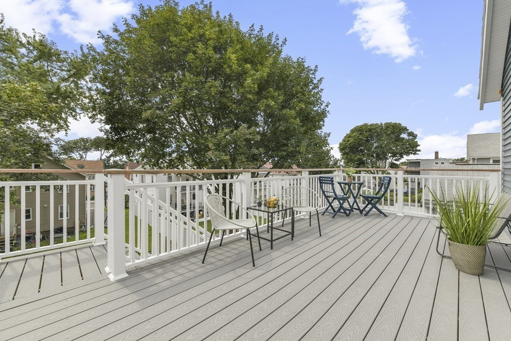 25 Locust Street, Unit 2 Winthrop, MA 02152 - Photo 11 of 29 a view of a chairs on deck and patio