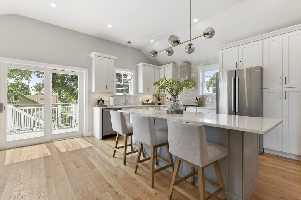 25 Locust Street, Unit 2 Winthrop, MA 02152 - Photo 5 of 29 a view of a dining room with furniture window and wooden floor