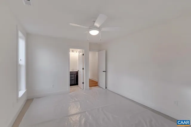 a view of empty room with an entrance