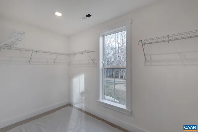 a view of small space with racks on the wall