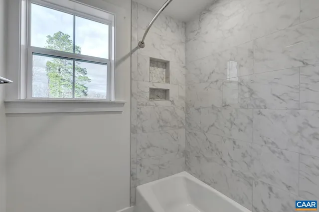 a bathroom with a bathtub