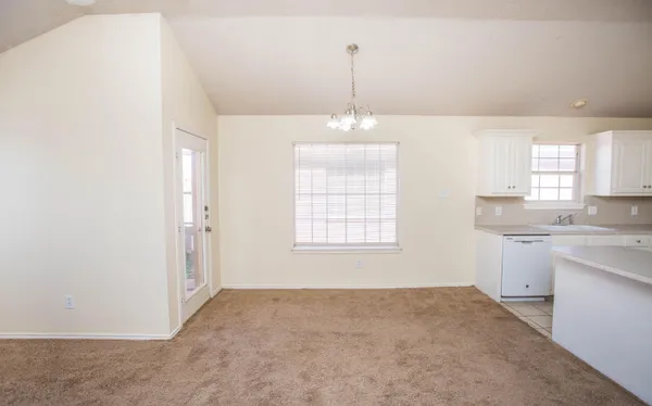 a view of a kitchen and a sink
