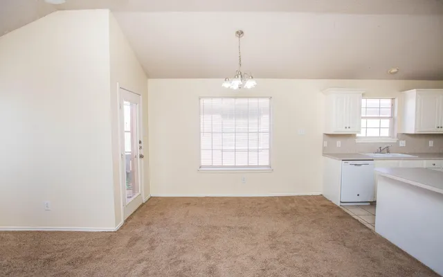 a view of a kitchen and a sink