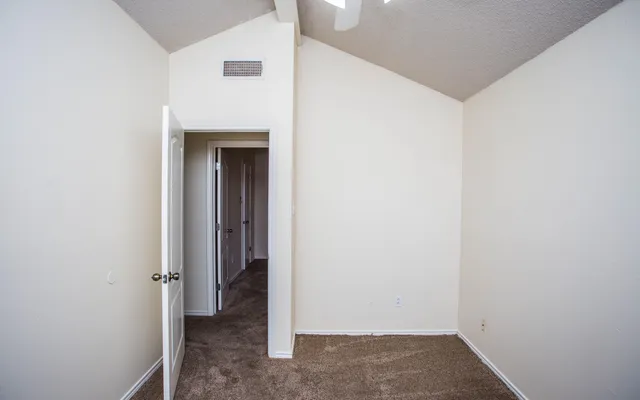 a view of a hallway with closet