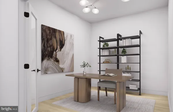 a hallway with a view of living room