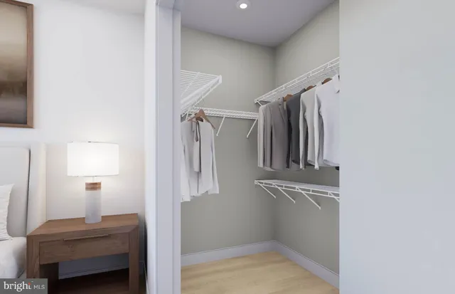 a bathroom with a double vanity sink mirror and toilet