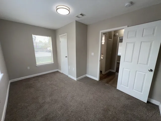 an empty room with windows