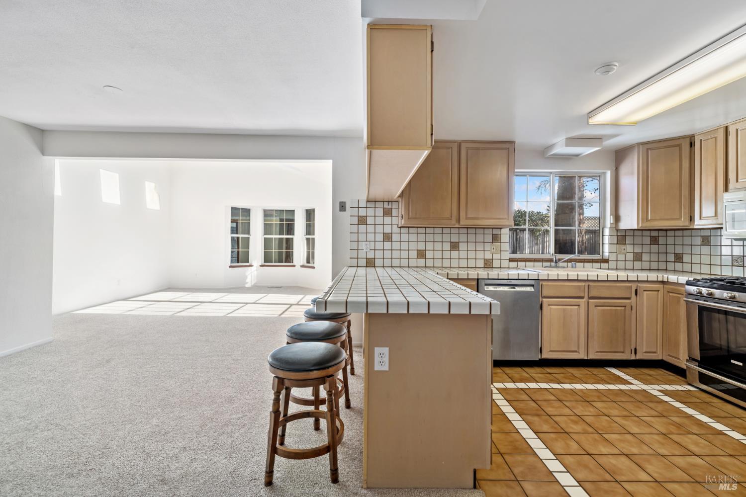 6 Oakhurst Place Santa Rosa, CA 95409 - Photo 13 of 42 a kitchen that has a sink and a stove in it