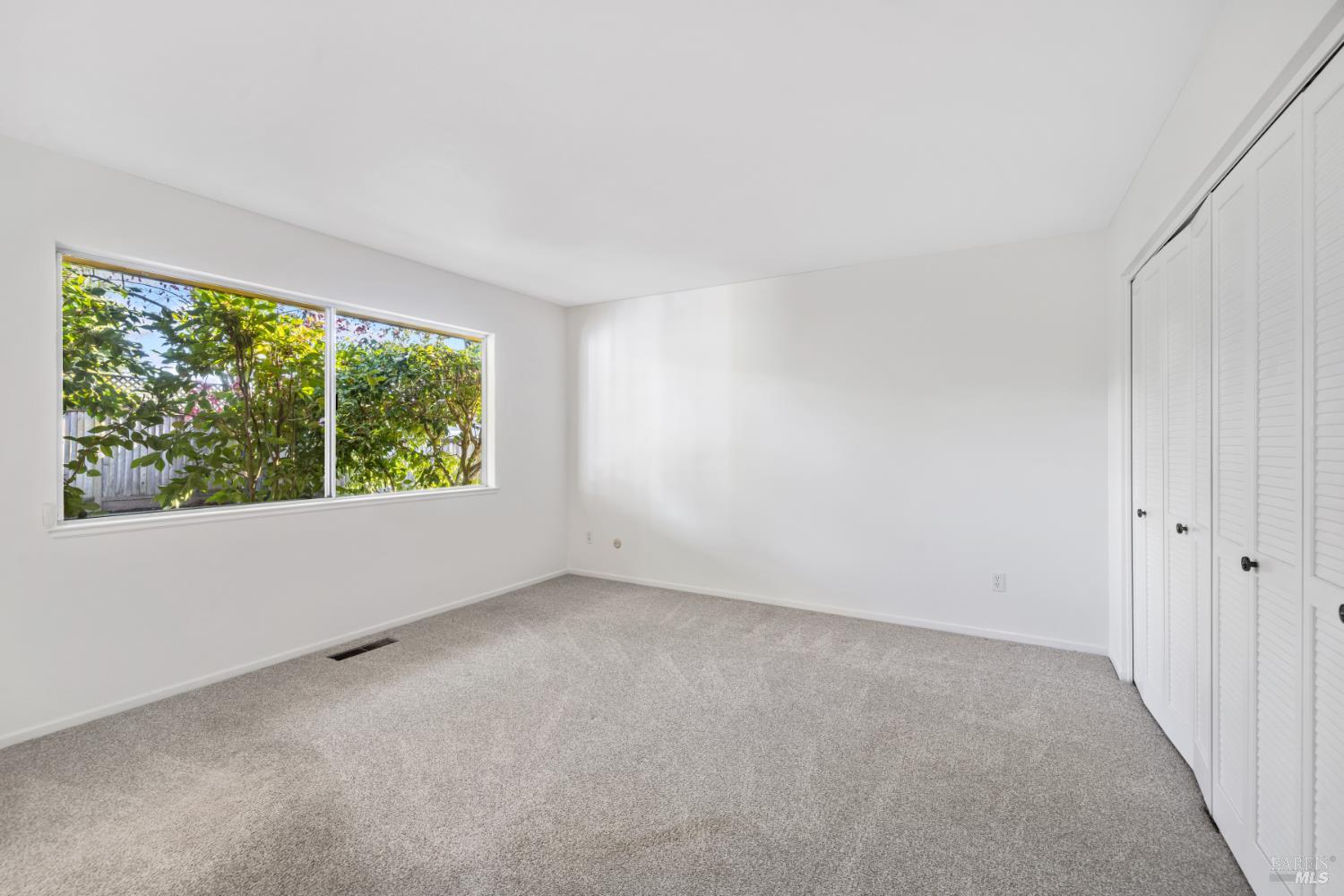 6 Oakhurst Place Santa Rosa, CA 95409 - Photo 21 of 42 a view of an empty room with a window