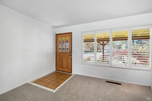 an empty room with windows