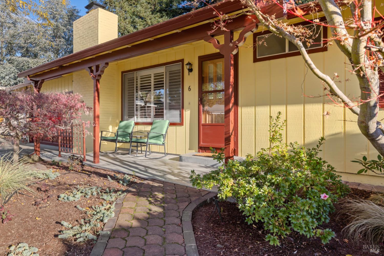 6 Oakhurst Place Santa Rosa, CA 95409 - Photo 39 of 42 a front view of a house with a yard and potted plants