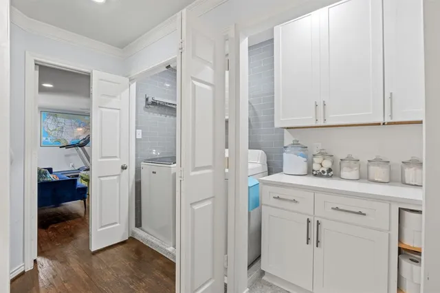 a spacious bedroom with a bed and a window