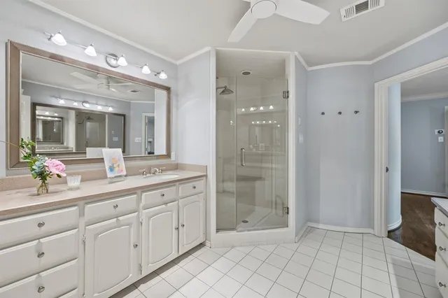 a bed room with a bed and a window