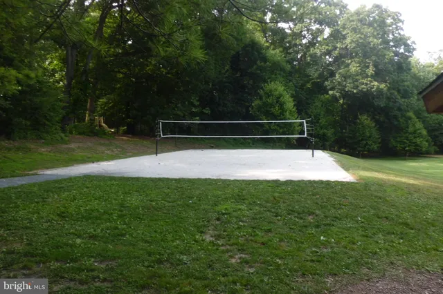a kitchen with stainless steel appliances granite countertop a sink and a microwave