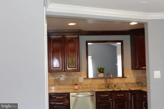 a close view of a sink and a mirror