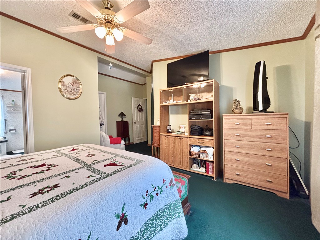 354 Harper Road Pendleton, SC 29670 - Photo 17 of 30 This spacious bedroom offers a tranquil retreat with comfortable flooring and soft lighting.