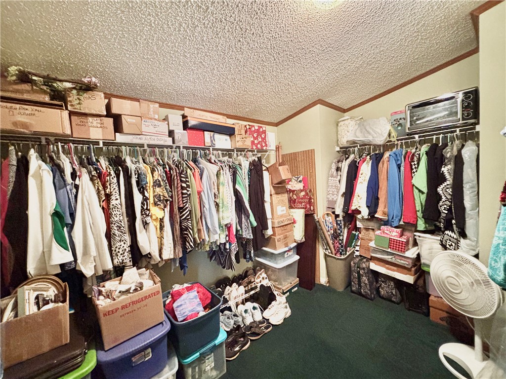 354 Harper Road Pendleton, SC 29670 - Photo 20 of 30 This spacious closet offers ample storage and organizational potential for any wardrobe.