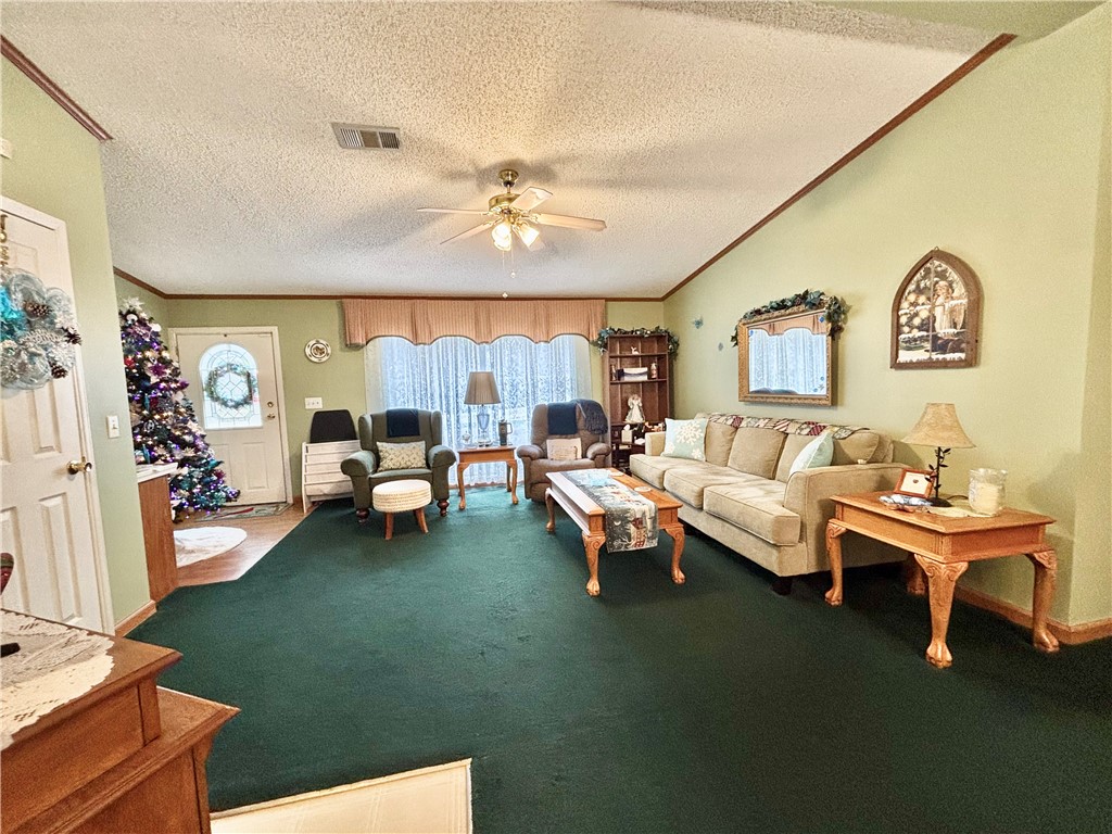 354 Harper Road Pendleton, SC 29670 - Photo 3 of 30 This inviting living area features vaulted ceilings, providing a spacious and open atmosphere.