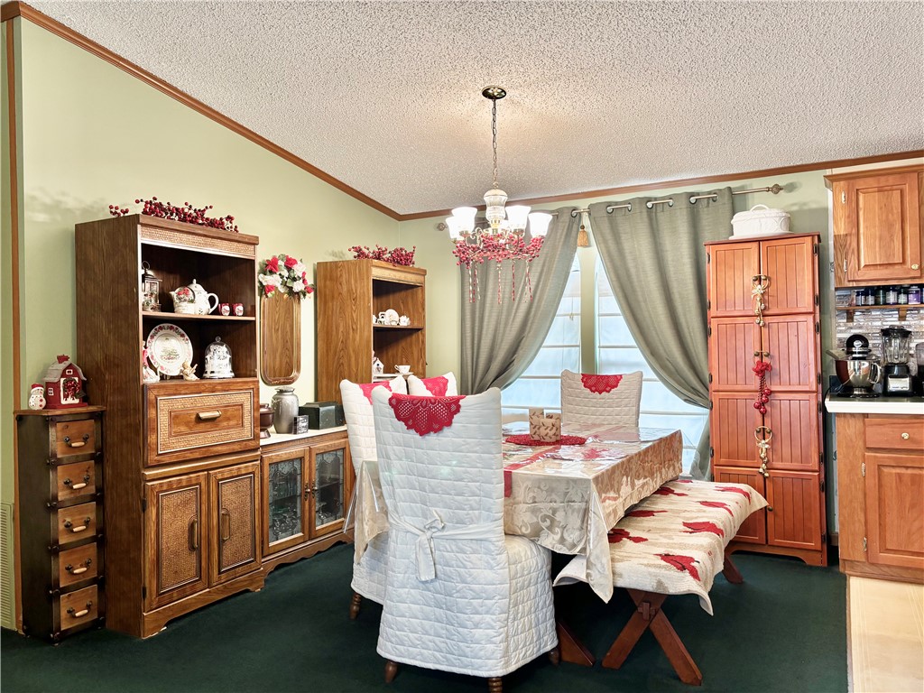 354 Harper Road Pendleton, SC 29670 - Photo 6 of 30 This inviting dining area features elegant furnishings and a cozy ambiance, perfect for intimate gatherings.