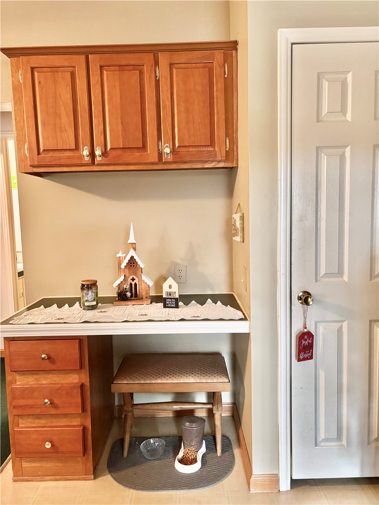 354 Harper Road Pendleton, SC 29670 - Photo 9 of 30 Functional built-in desk area with overhead cabinetry offers convenient utility.