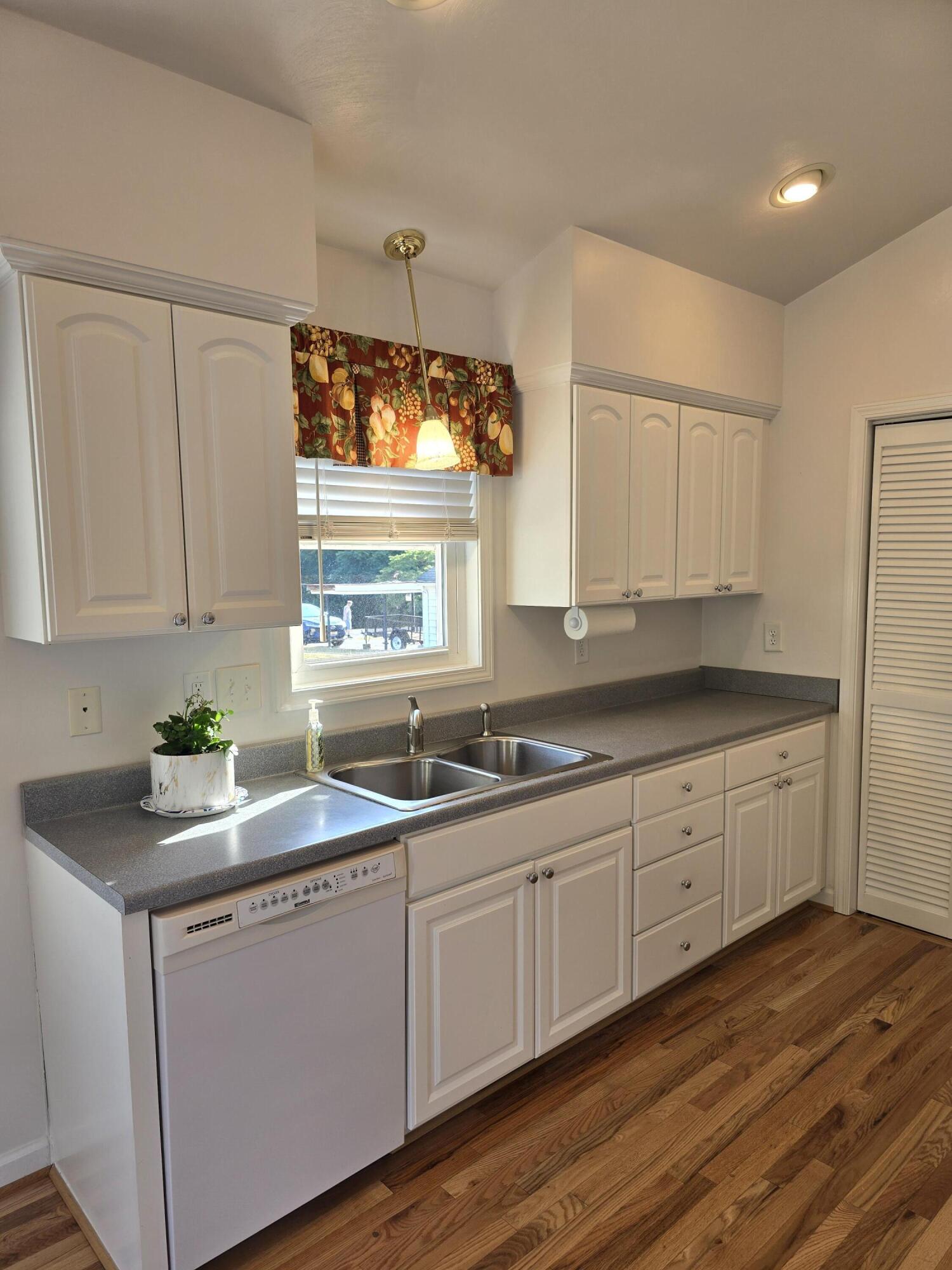 2341 Highland Road Roanoke, VA 24014 - Photo 9 of 30 a kitchen with sink cabinets and window