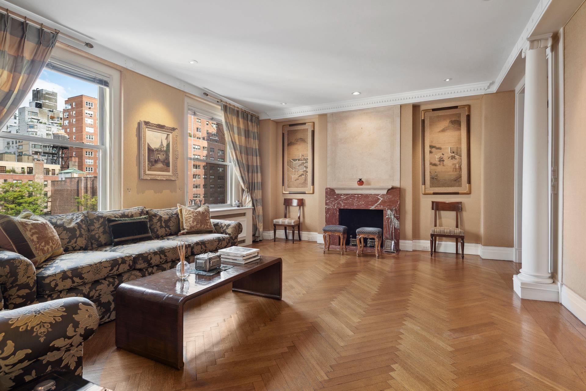 155 East 72nd Street, Unit 7C/8CD Manhattan, NY 10021 - Photo 10 of 17 a living room with furniture and large windows