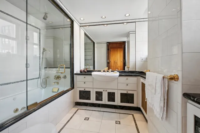 a picture of a bathroom with a sink