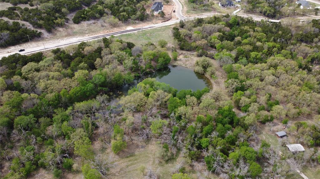 1039-1033 Creek Crossing Road Nemo, TX 76070 - Photo 18 of 31 an aerial view of a house with a yard