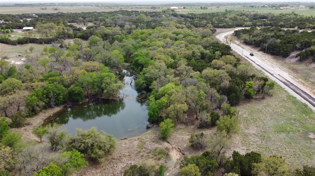 1039-1033 Creek Crossing Road Nemo, TX 76070 - Photo 21 of 29 an aerial view of residential houses with outdoor space and trees