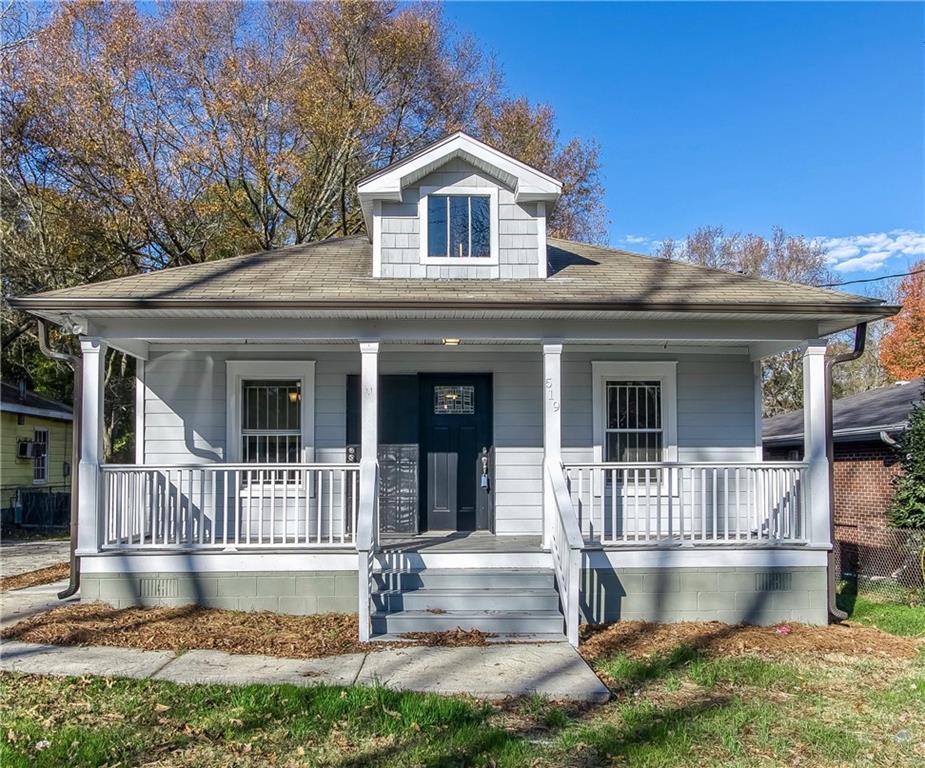 519 Mount Zion Road Southwest Atlanta, GA 30315 - Photo 1 of 1 front view of a house with a yard