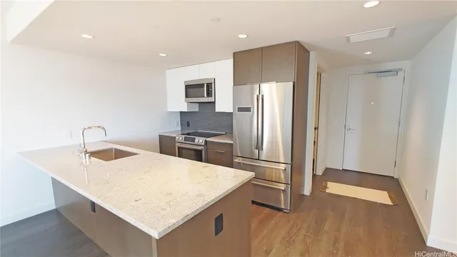 a living room with a sink and a window