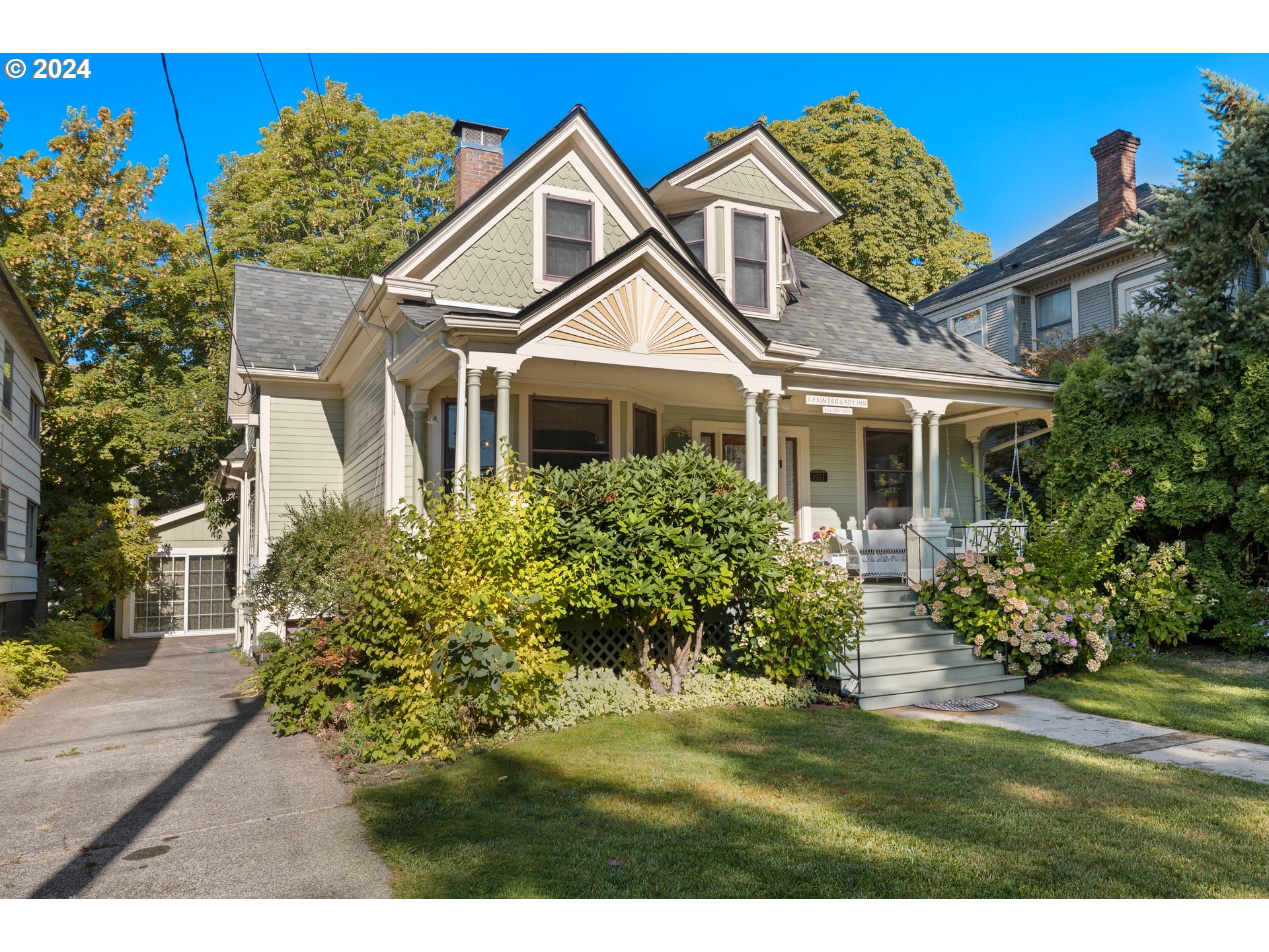 1927 Northeast 16th Avenue Portland, OR 97212 - Photo 3 of 43 a front view of a house with a yard
