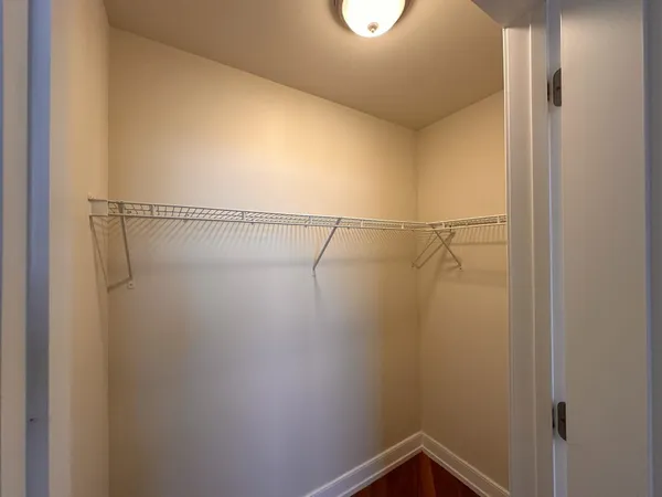 a view of a room with racks on the wall