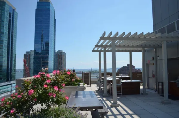 a view of a terrace with sitting area