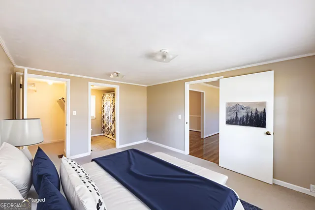 an empty room with a empty space and windows