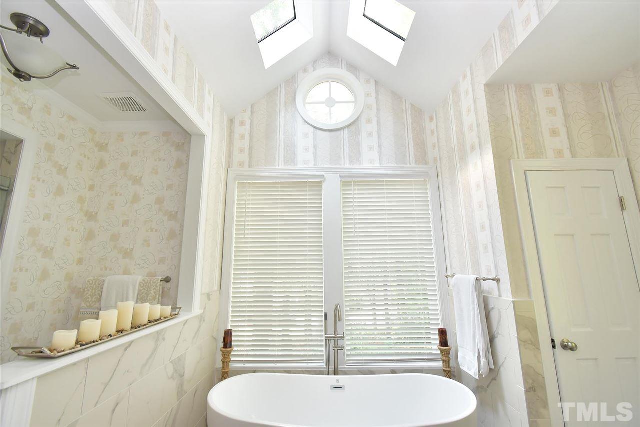 5220 Lenoraway Drive Raleigh, NC 27613 - Photo 16 of 30 Another view of the back section of the Master Bathroom with high ceiling.