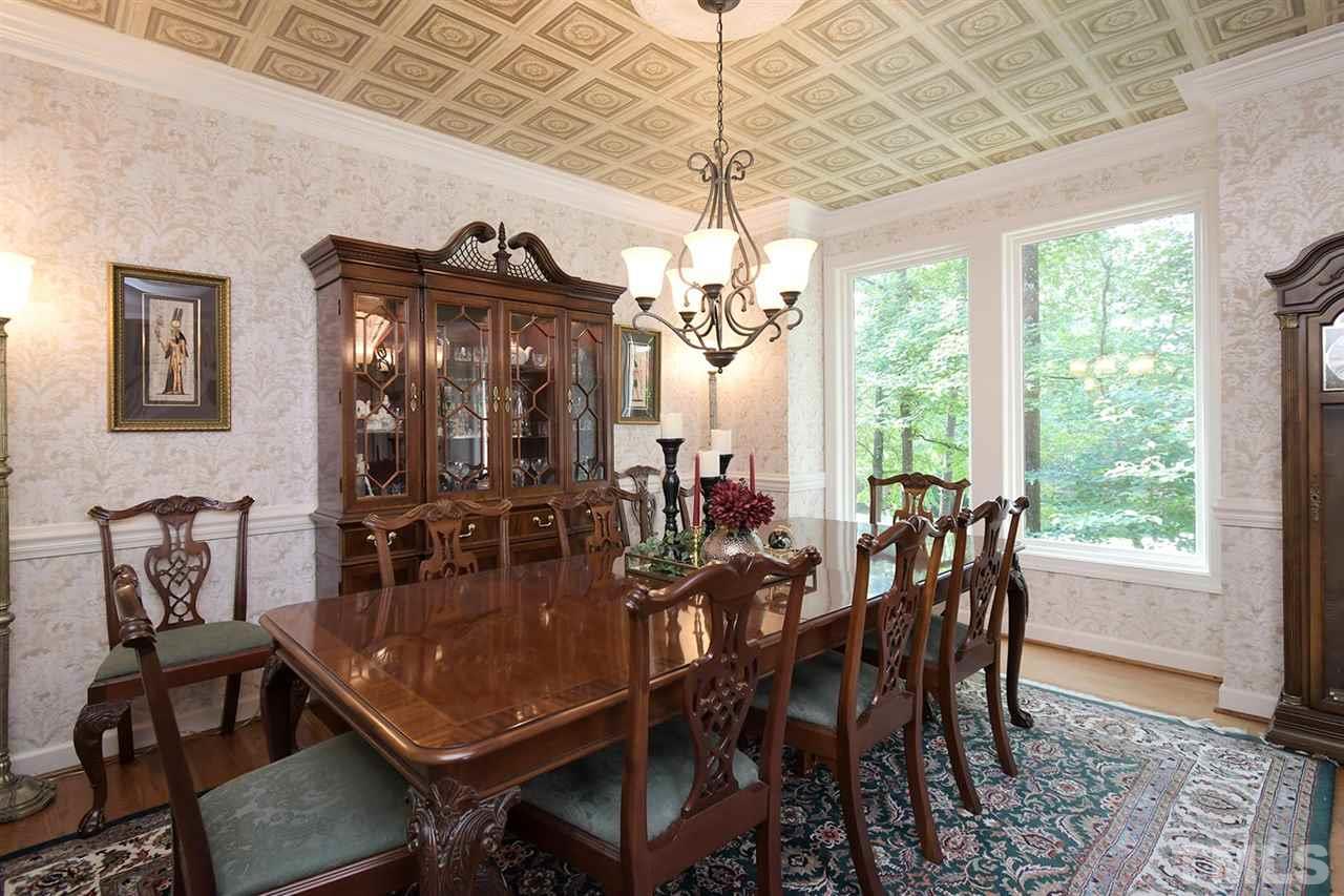 5220 Lenoraway Drive Raleigh, NC 27613 - Photo 5 of 30 Dining Area with two large front windows and chair railing.