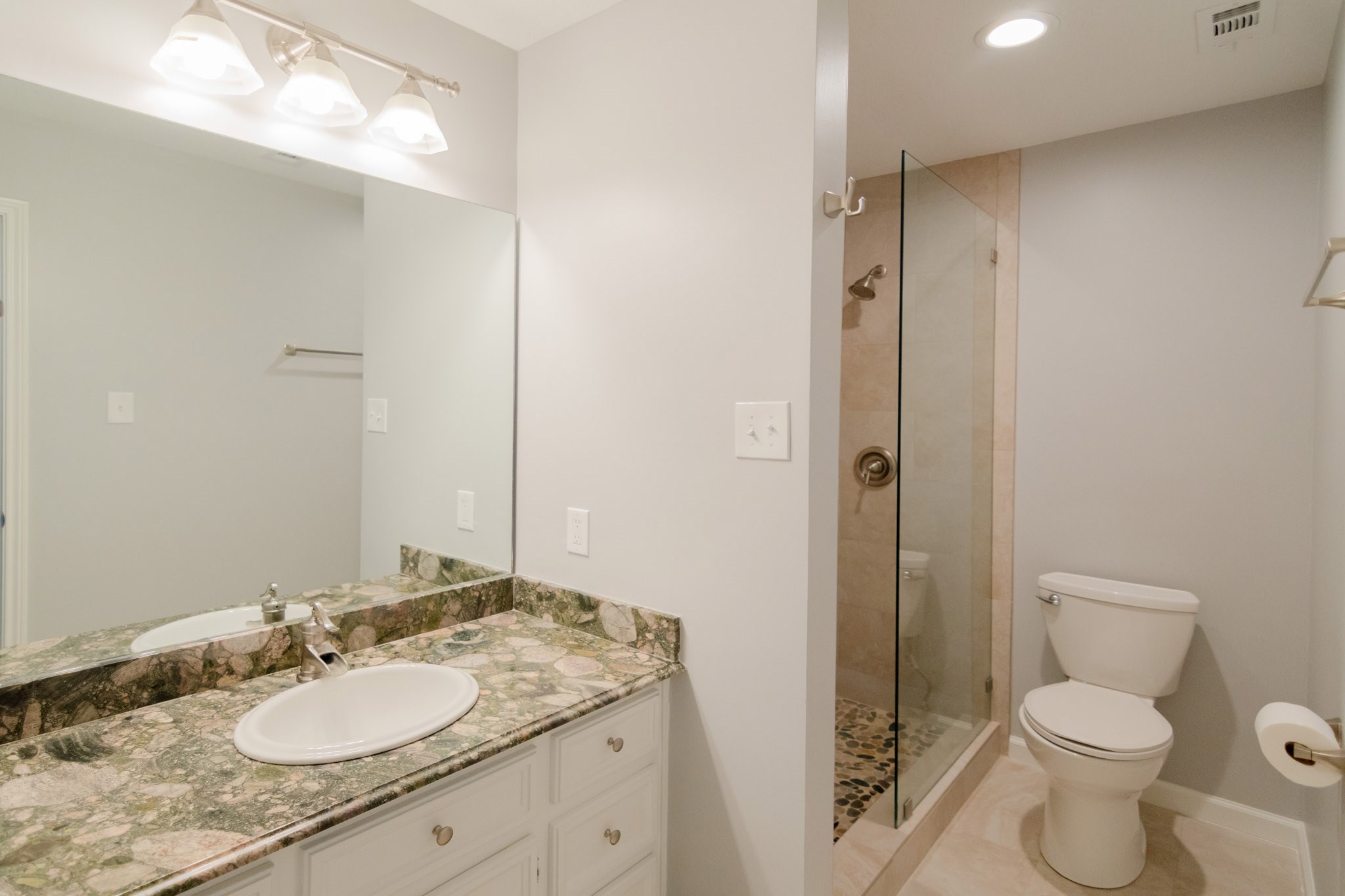 10 Coralvine Court Spring, TX 77380 - Photo 26 of 34 Bathroom 2 has new custom single vanity with beautiful counter and silver fixtures.